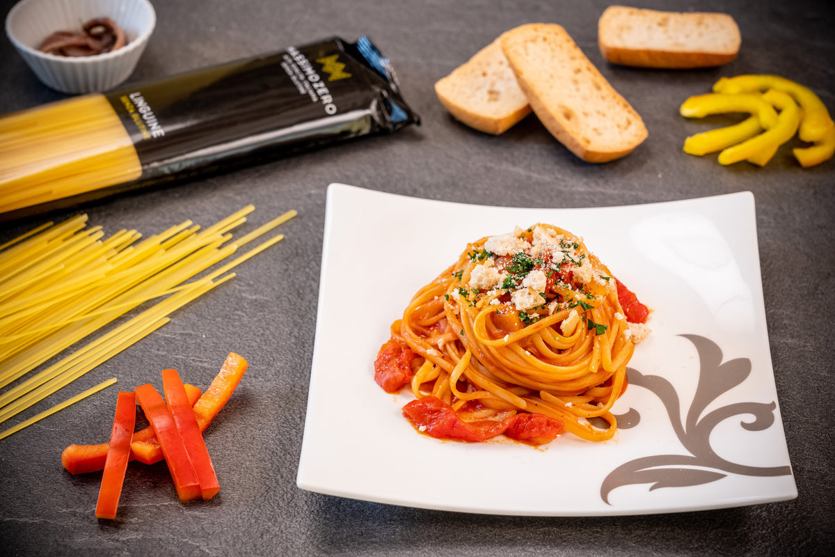 Massimo Zero linguine with peppers, anchovies and crisp breadcrumbs on a white plate
